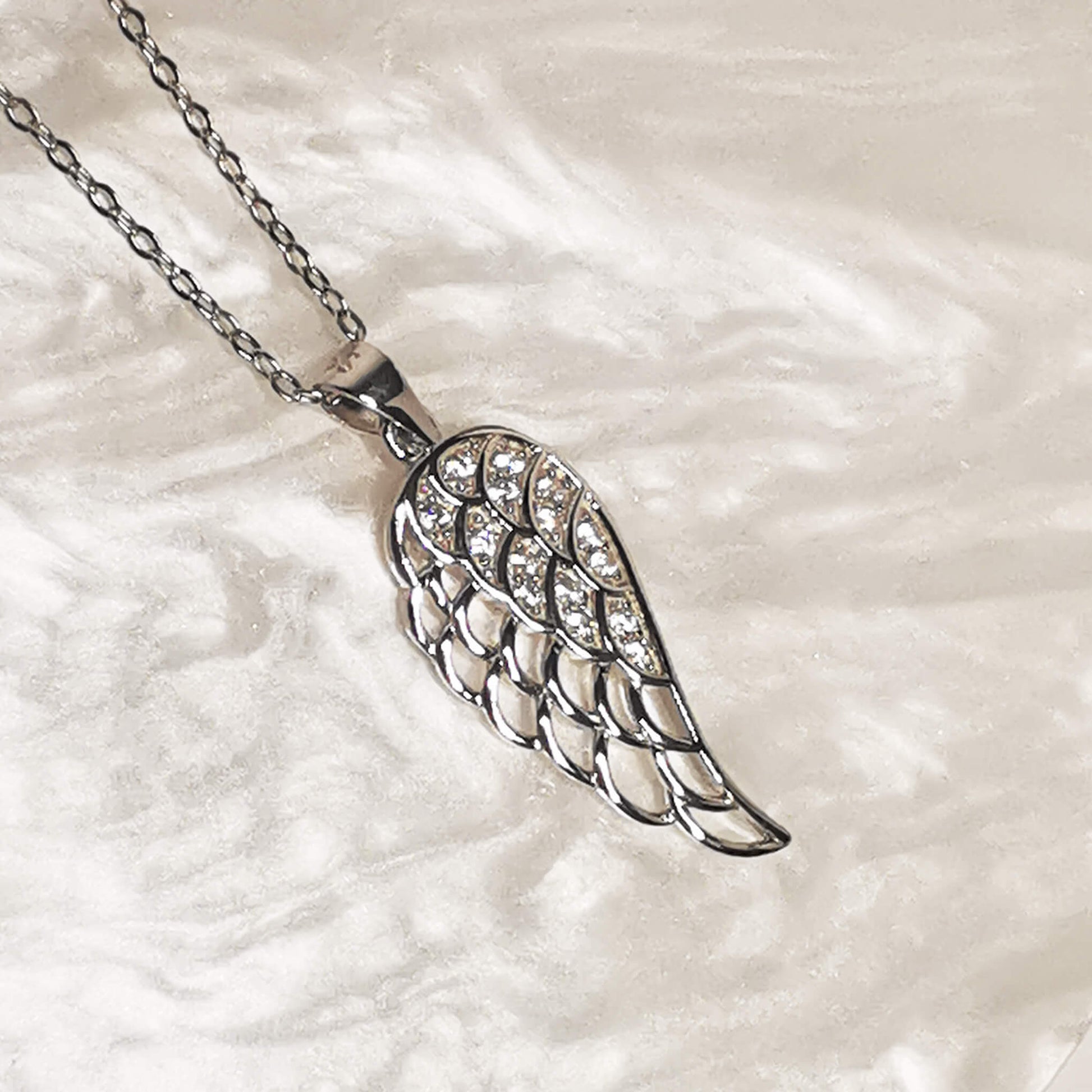 High quality 925 sterling silver angel wing memorial necklace.   The perfect loss, remembrance, sympathy stillbirth, child loss gift.