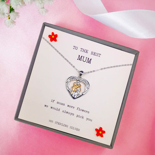 Sterling silver and rose gold necklace depicting mum hugging two children in wings. Features the quote "if mums were flowers we would always pick you". Comes boxed with quote insert. 